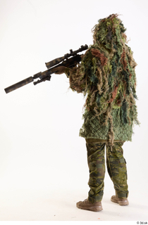 Andrew Elliott in Ghillie Aiming Gun aiming gun standing whole…